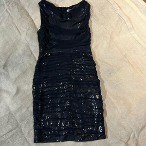 Navy silk overlay, full gold sequin attached underlay.
